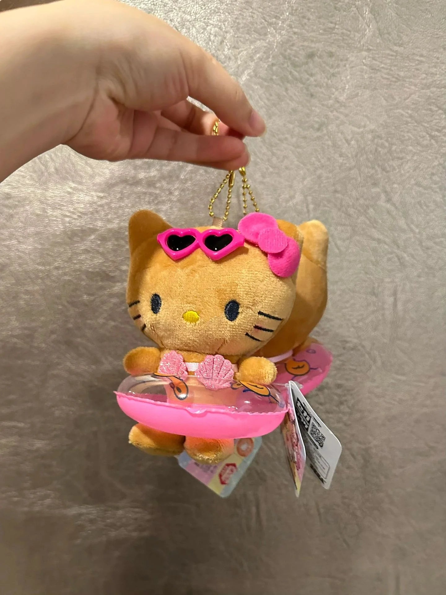 Hello Kitty Tan Swimming
Ring Plush Keychain
